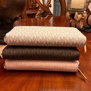 MICHAEL KORS LARGE CONTINENTAL WALLETS SOLD TOGETHER